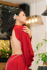 Silk cutout evening gown with draped open sleeves and asymmetric hemline